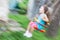 Little girl on swing with motion blure