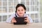 Little girl with a tablet. Communication, school education, games of a child, a teenager with a modern device. interactive social