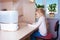 Little girl with tablet pc sitting near humidifier