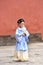 Little Girl taking costume portraits in the Forbidden City