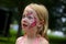 Little Girl with Unicorn Painted on Face