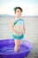 Little Girl Vintage Bathing Suit in Plastic Pool