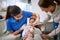 Little girl visiting dentist .Dentist examining tooth patient in ambulant