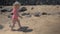 Little girl walking at the beach