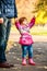 Little girl walks with my dad