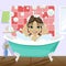 Little girl washing her hair with shampoo sitting in bathtub in bathroom