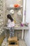 Little girl washing some dishes in her home kitchen