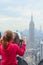 Little girl watching New York Empire State Building