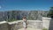 Little girl waves with a Greek flag on Vikos gorge Zagoria