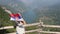 Little girl waves with a Serbian flag on the mountain Tara Serbia