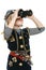 Little girl wearing costume of pirate looking away through the binoculars