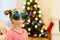 Little girl wearing funny Christmas glasses