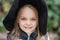 little girl in whitch costume celebrate Halloween outdoor and have a fun