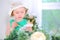 Little girl in white beret with watercolor paints