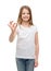 Little girl in white t-shirt showing ok gesture