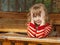 Little girl in wooden canopy outdoor