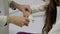 Little girl and young doctor in hospital having examination.