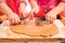 Little girls cutting christmas cookies