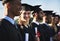 Little girls with dreams become women with vision. Portrait of a smiling university student on graduation day with