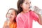 Little girls drinking mineral water