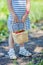 Little girls hands holding basket full of strawberries at pick your own farm