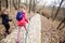 Little girls hiking through autumn forest