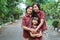 Little girls, mothers and grandmothers pose while on vacation together