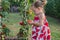 Little girls picked tomatoes