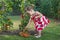 Little girls picked tomatoes