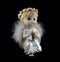 Little guardian angel isolated on black background. Vintage decoration