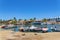 Little harbor with motor boats and houses