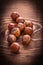 Little heap of hazelnuts on vintage board food and
