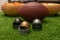 Little helmets  american football ball and snacks on green grass