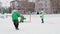 Little hockey player attacks gate passing protection on rink