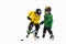 Little hockey players with the sticks on ice court and white studio background