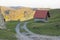 Little hut with red roof and dirt road in beautiful forest landscape