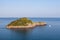 Little island named `L`Isolotto` in Tuscany, Italy