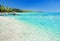 Little jetty on tropical beach with amazing water