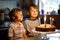 Little kid boys twins celebrating birthday and blowing candles on cake