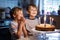 Little kid boys twins celebrating birthday and blowing candles on cake