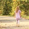 Little kid - girl walking barefoot