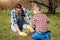 Little kid and his father gardening together