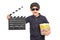 Little kid holding popcorn and a clapperboard