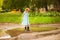 Little kid runs through a puddle. summer outdoor