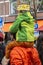Little Kid On The Shoulders Of His Father During Kingsday At Amsterdam The Netherlands 27-4-2019