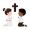 Little kids kneeling with cross first communion