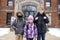 Little Kids Standing in Front of School Building with Protective Covid Masks