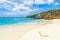 Little Knip beach - paradise white sand Beach with blue sky and crystal clear blue water in Curacao, Netherlands Antilles, a