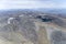 Little lake atop Hawkdun range barren slopes, near Omarama, New Zealand