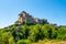 Little medieval town skyline of Grotte di Castro, Lazio, Italy, with blue sky in background